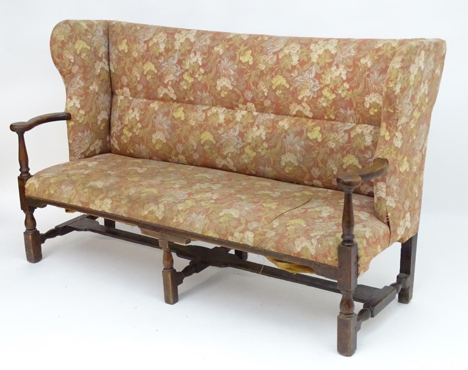 A mid 18thC wingback sofa with scrolled arms and an upholstered backrest and seat above a - Image 4 of 12