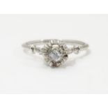 A diamond solitaire ring in platinum setting. Ring size approx size P Please Note - we do not make