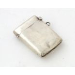 A silver vesta case, hallmarked Birmingham 1921, maker W.J. Myatt & Co. Approx. 2" high Please