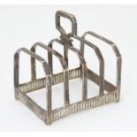A silver five bar toast rack, hallmarked Sheffield 1927, maker Mappin & Webb. Approx. 3" long Please