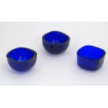 Three blue glass cruet liners, each approximately 1 7/8" wide (3) Please Note - we do not make