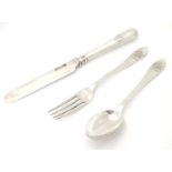 A silver three piece christening set comprising knife, fork and spoon. Hallmarked London 1905/06