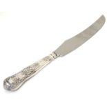A silver Kings Pattern bread knife, hallmarked Sheffield 1965, maker Harrison Brothers. Approx.