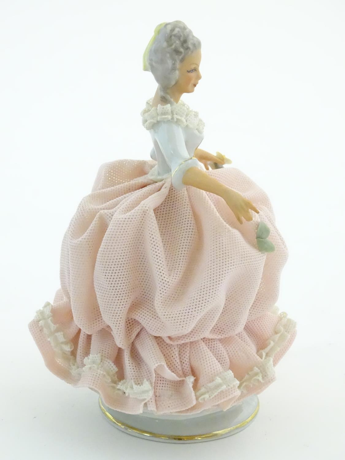 A Dresden model of a lady with a porcelain lace dress. Marked under. Approx. 5 3/4" high Please Note - Image 3 of 6