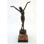 A 20thC French Art Deco style cast bronze model of a dancing exotic / Egyptian lady, after D.H.