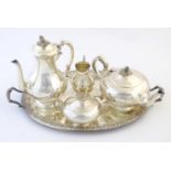 A Silver plated four piece tea and coffee set with engraved decoration together with a silver twin
