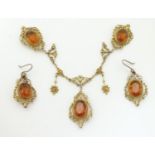 A pair of gilt metal drop earrings set with facet cut citrine stones, together with a matching