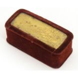 A Victorian trinket box with velvet covering, the top with a relief plaque depicting a landscape