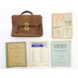 A late 19th / early 20thC leather attache case containing sheet music to include Edward Grieg -