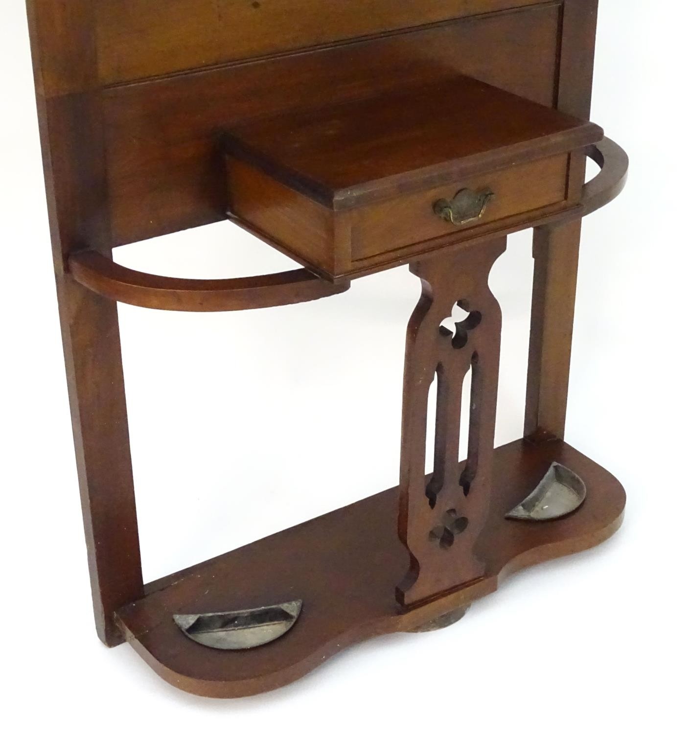 A late 19thC / early 20thC mahogany hall stand with a moulded cornice above turned finial supports - Image 5 of 7