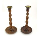 A pair of late 19th / early 20thC candlesticks with barley twist columns. Approx. 11 3/4" high (2)