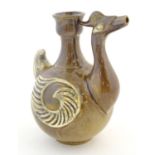 A Thai Sawankhalok style bird / duck vase with relief detail. Approx. 9" high Please Note - we do