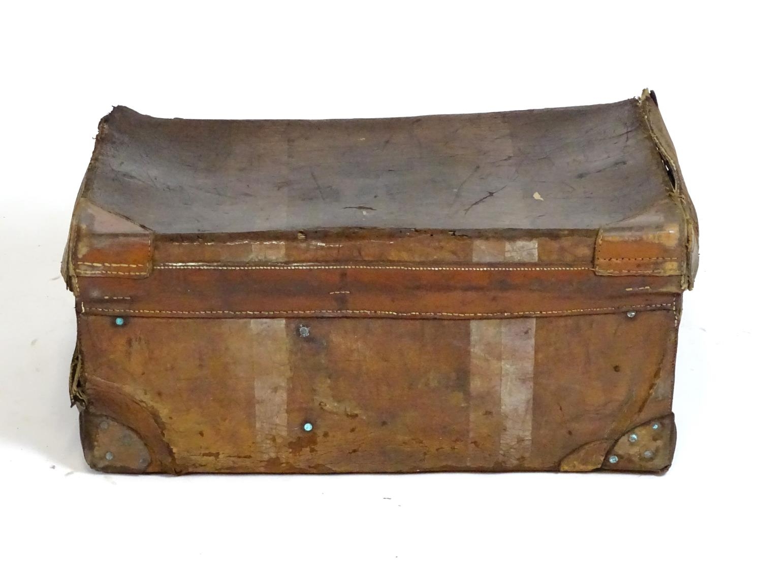 A late 19th / early 20thC leather travelling trunk with two carry handles. Approx. 14" x 32" x 21" - Image 2 of 4