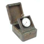A carved pocket watch travelling case / stand. Together with a pocket / fob watch. (2) Please Note -