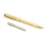 A mid 20thC Asprey, London, combination fountain and ballpoint pen, the casing stamped 'Rolled