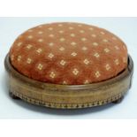 A late 19thC tumbridgeware footstool with a circular upholstered top above an inlaid base and