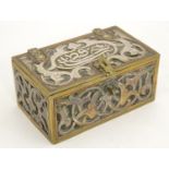 A 19thC cedar lined brass box, with inlaid silver plate and copper decoration with Islamic script.