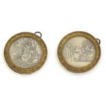 A pair of early 20thC gilt metal miniature frames of circular form with cast detail. Approx. 2"