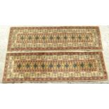 Carpet / Rug : Two runners with banded motifs to the central ochre coloured ground bordered by