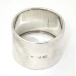 An early 20thC silver napkin ring hallmarked London maker Charles Edwards Please Note - we do not