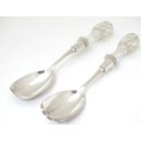 A pair of Victorian silver salad servers with glass handles, hallmarked Sheffield 1883. Approx. 10
