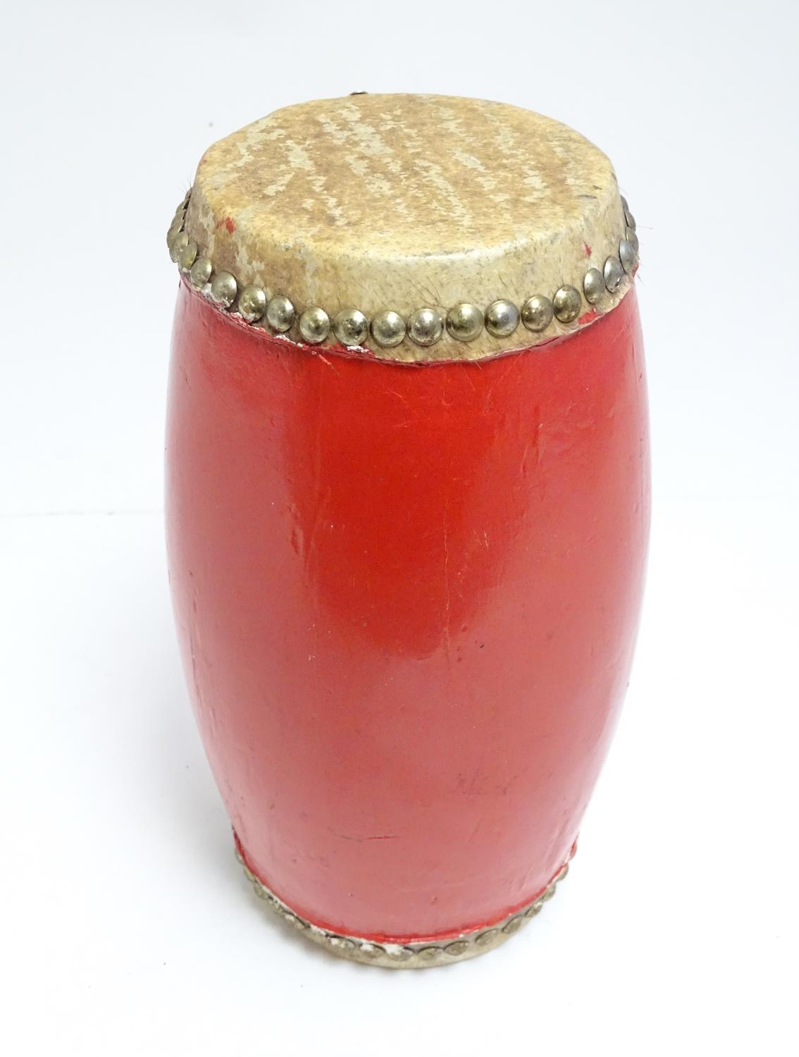 Musical Instrument: a mid 20thC Dholak drum, of elliptical form with dual skins, strap loops, in red - Image 3 of 6