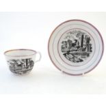 A tea cup and saucer with monochrome transfer decoration depicting a river landscape with a ship and
