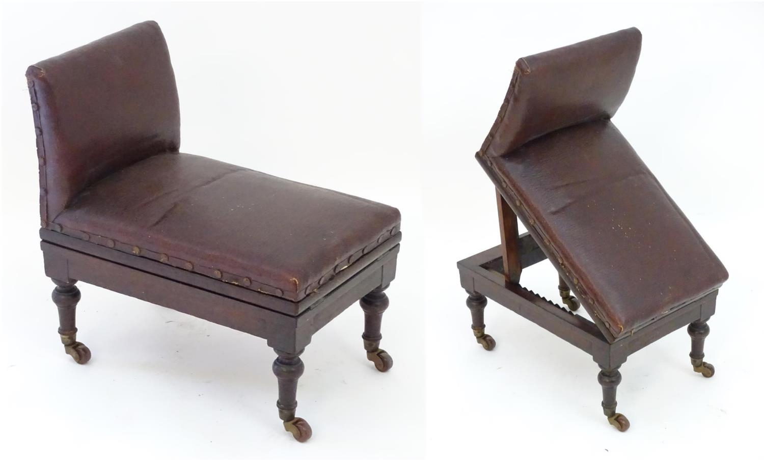A late 19thC mahogany adjustable gout stool with leather upholstery and studded detailing,