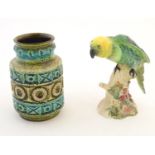 A Beswick model of a parrot, no. 930. Together with a West German vase. Marked under. Parrot approx.