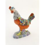 A Continental model of a cockerel / rooster. Approx. 6 3/4" high Please Note - we do not make