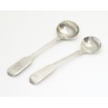 Two silver Fiddle Pattern salt spoons, one Scottish, hallmarked Edinburgh 1814, maker George