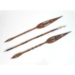 Ethnographic / Native/ Tribal : A tribal spear with banded leather grips. Together with two carved