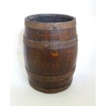 A 20thC coopered oak basket converted from a pin ale barrel, 12 1/2'' tall Please Note - we do not