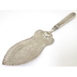 A 19thC Austrian silver cake / pie slice, the blade with pierced and engraved foliate decoration.