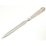 A silver handled Kings Pattern paper knife, hallmarked Sheffield 1978, maker Harrison Brothers.