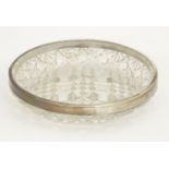 A cut glass dish with silver rim hallmarked Birmingham 1904 4" diameter Please Note - we do not make