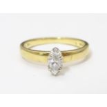 An 18ct gold ring set with diamond to centre. Ring size approx I 1/2 Please Note - we do not make