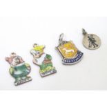 Four assorted fobs / charms, two formed as dwarves, Happy and Bashful, together with two others (