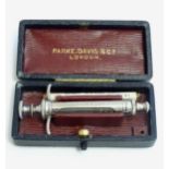 An early 20thC cased syringe and needles by Parke, Davis & Co., London. Case approx. 3 1/2" wide