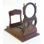A Victorian folding graphoscope viewer with hinged platform base, two lenses and a 3 3/4"