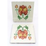 Two tiles decorated with stylised tulip / flower detail. Marked Made in England verso. Approx. 6" (