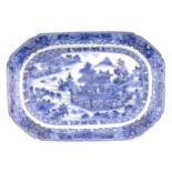 A Chinese blue and white meat plate / platter depicting a landscape scene with mountains, pagodas,