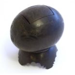 A 19thC carved coconut shell with stand and rectangular lid, profusely decorated with scrimshaw /