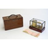 A mid 20thC cased barograph. Case approx. 7" x 10 3/4" x 5" Please Note - we do not make reference