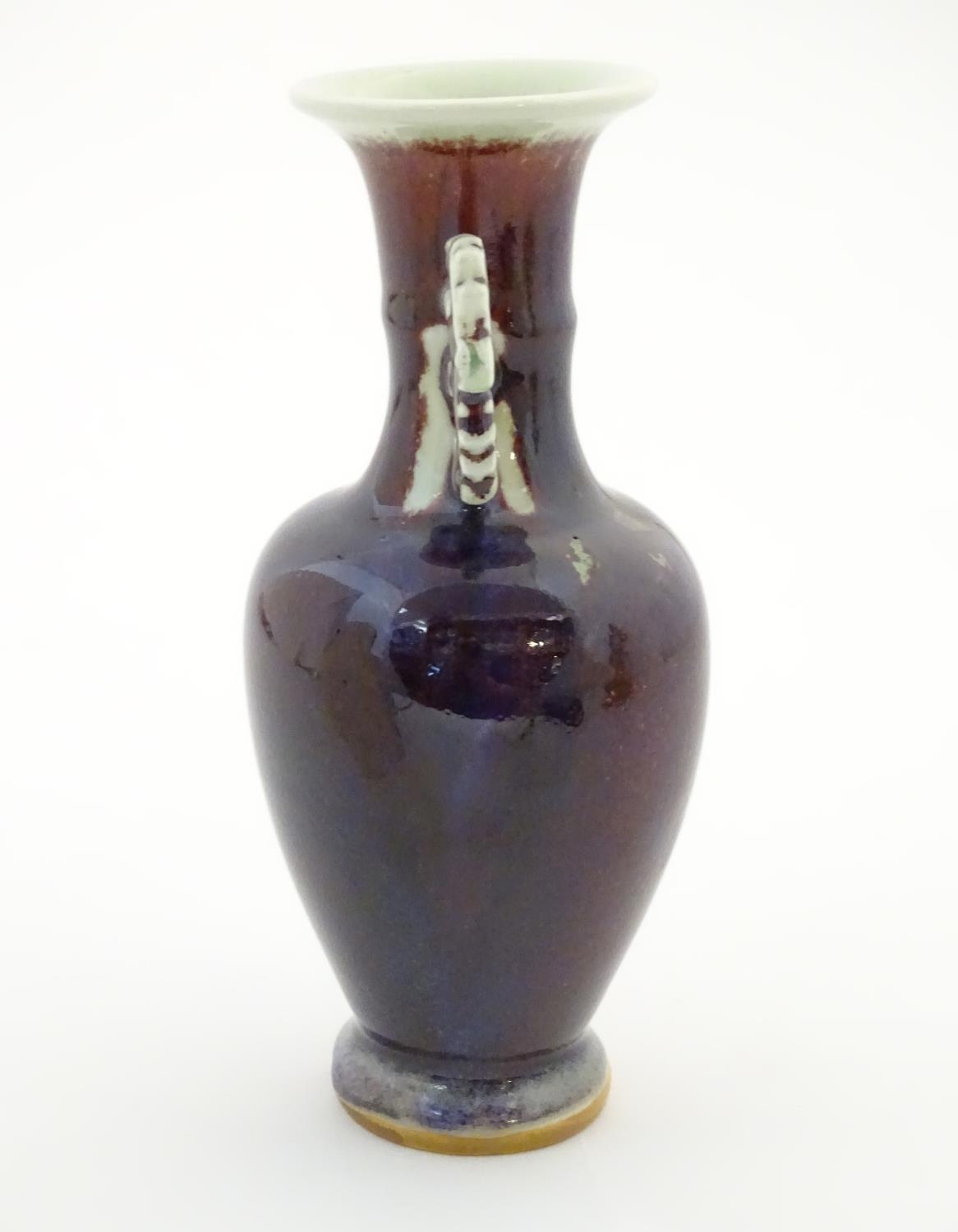 An Oriental twin handled vase, the handles with foliate detail. Approx. 8" high Please Note - we - Image 5 of 6