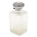 A cut glass scent bottle of square form with silver top and mounts, hallmarked Birmingham 1903,