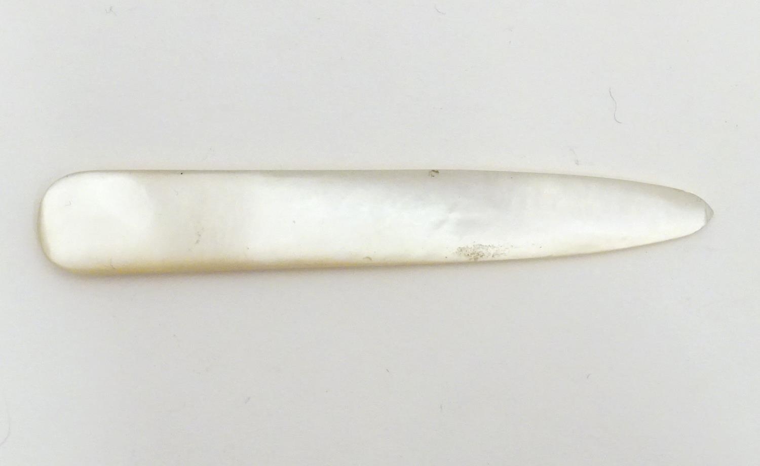 An early 20thC mother of pearl letter opener with shell detail. Approx. 4 1/4" Please Note - we do - Image 8 of 8