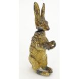 A late 19th / early 20thC Continental cold painted model of a seated hare with a sprung head.