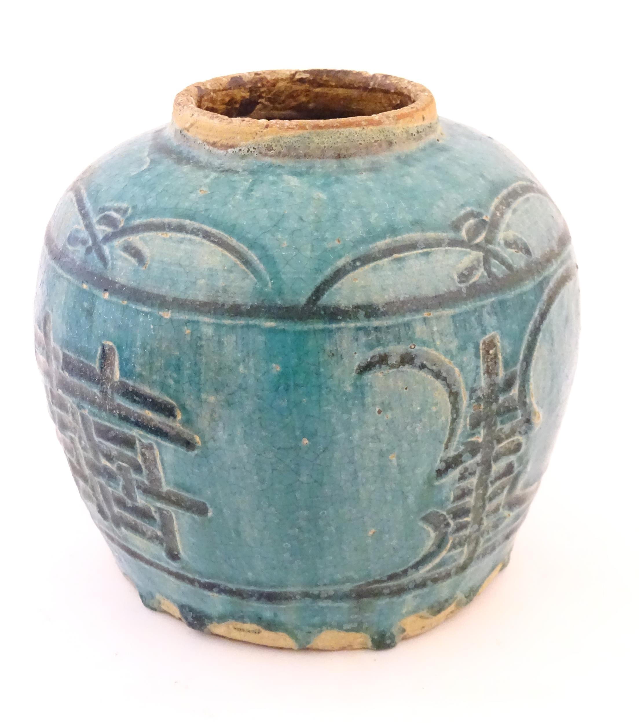 A Chinese ginger jar / vase with a turquoise glaze and character mark decoration. Approx. 7 1/2" - Image 6 of 11