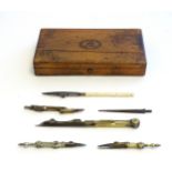 A Victorian cased drawing / draughtsman's tools / instruments to include compasses. The lid